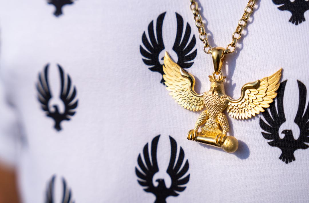 Adler"WEITSICHT" in Gold mit Krone und Mikrofon